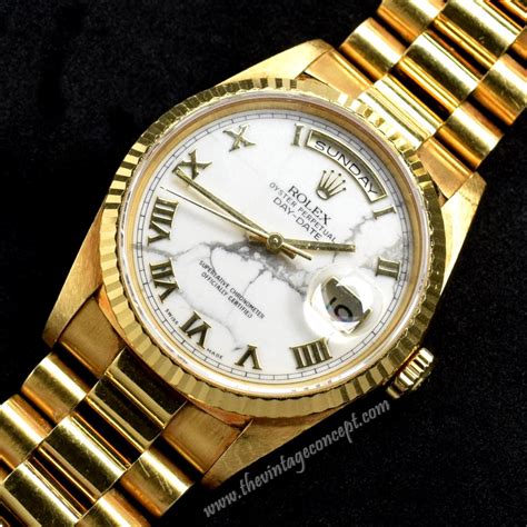 rolex day date gold marble dial